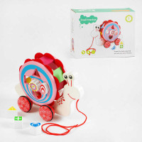 Деревяна каталка C 64011 “Равлик” сортер 5 фігурок обертається мушля