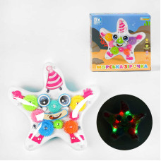 Музична іграшка Морська зірочка TK - 21203 TK Group ОЗВУЧУВАННЯ УКРАЇНСЬКОЮ МОВОЮ підсвічування колесо вільного ходу рухомі шестерні TK Group