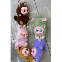 М'яка іграшка-брелок M 19490 ЦІНА ЗА 1 ШТУКУ герой висота 15 см гумове обличчя металевий карабін заводний механізм голова стопи та долоні обертаються на 360°