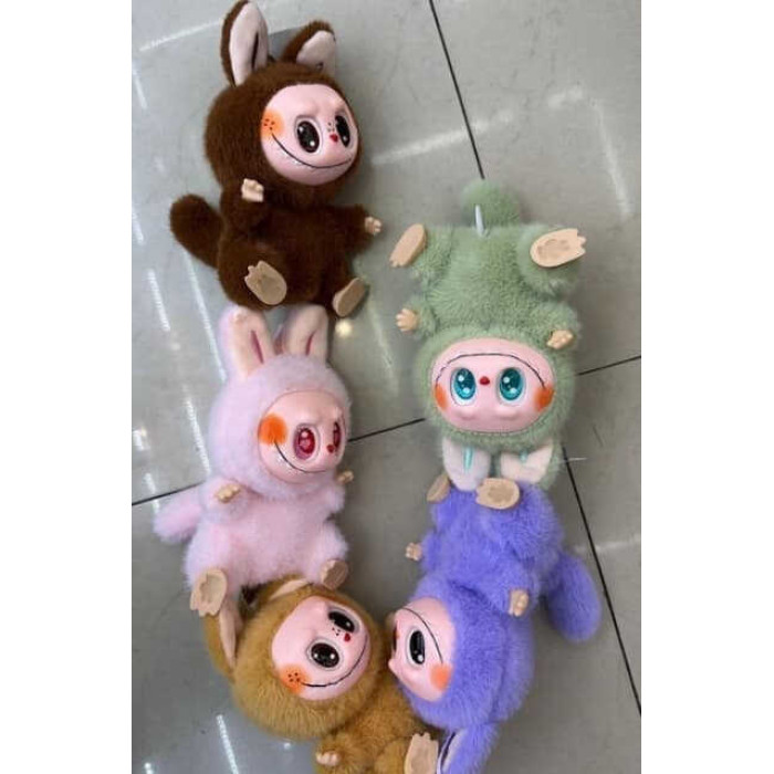 М'яка іграшка-брелок M 19490 ЦІНА ЗА 1 ШТУКУ герой висота 15 см гумове обличчя металевий карабін заводний механізм голова стопи та долоні обертаються на 360°